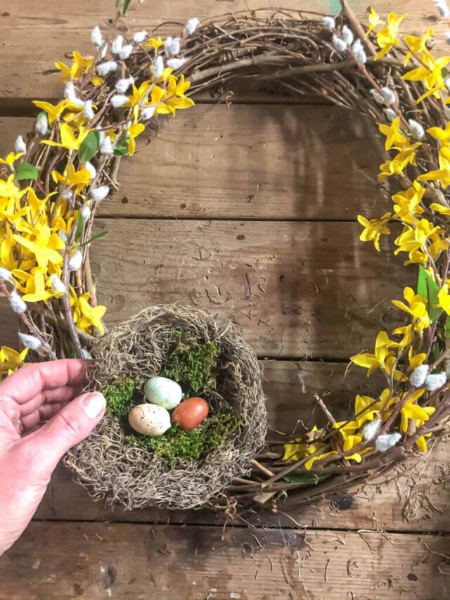 making a wreath with forsythia and a bird nest