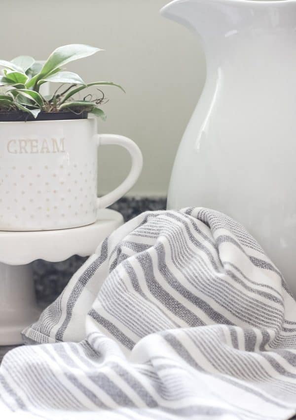 Kitchen towel and pitcher