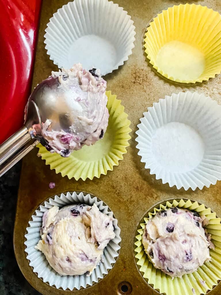 SCOOPING BATTER INTO MUFFIN PAN