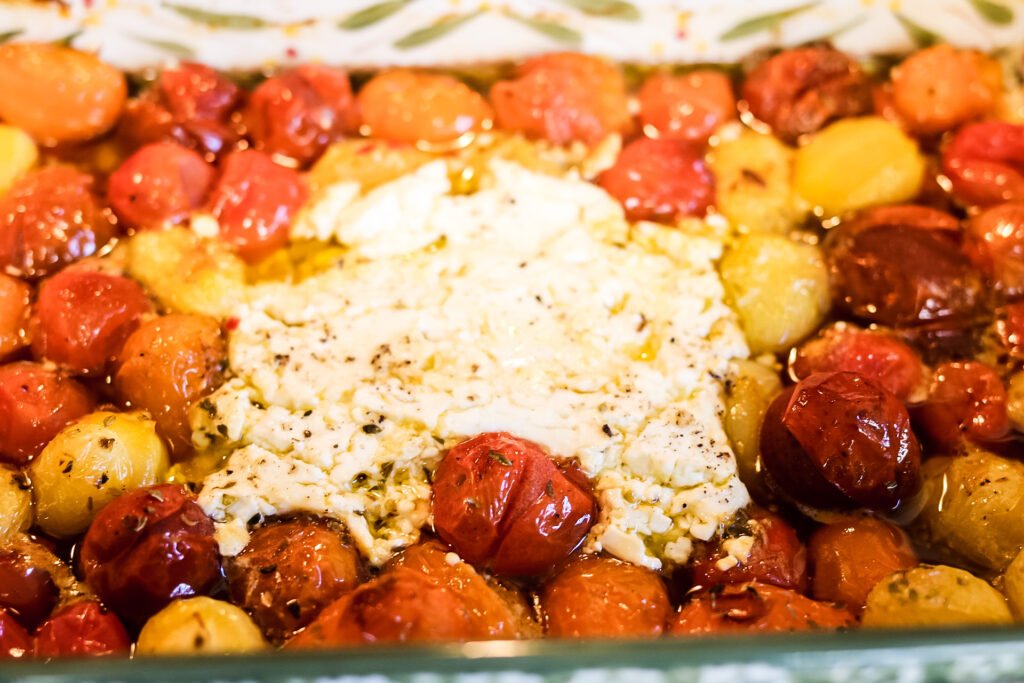 feta baked pasta coming out of the oven