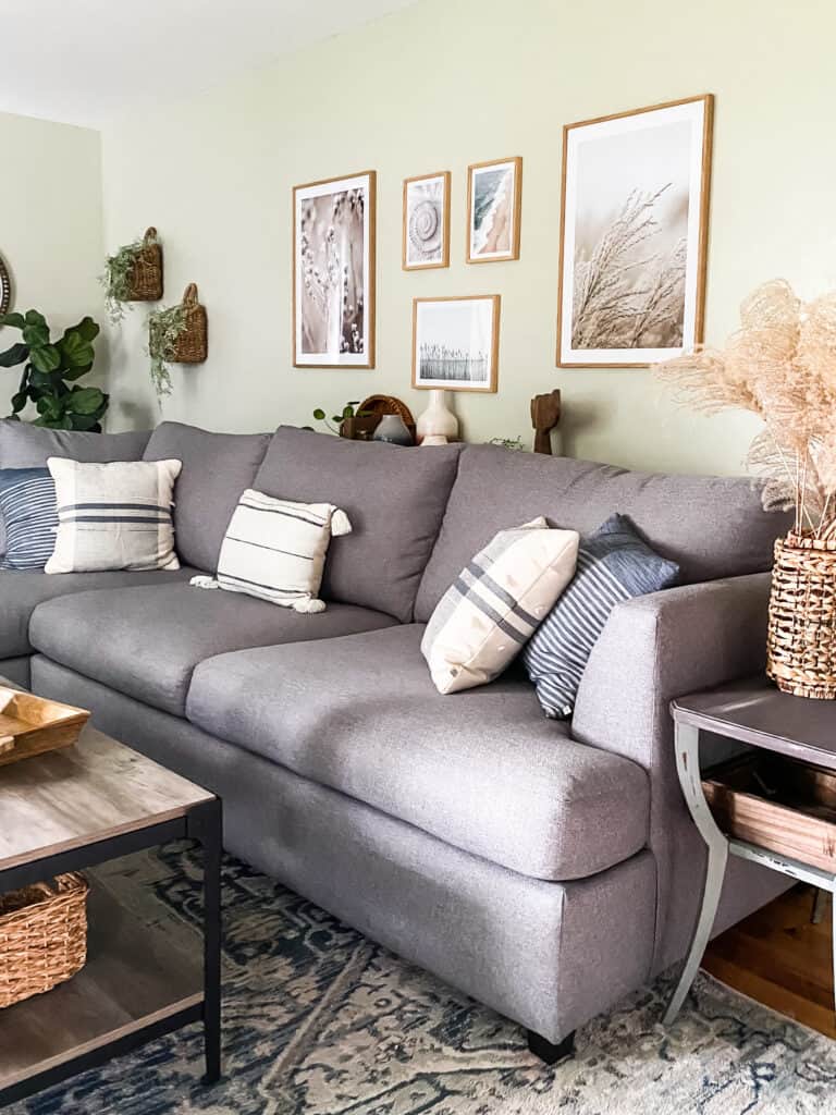 gray sectonal with blue pillows