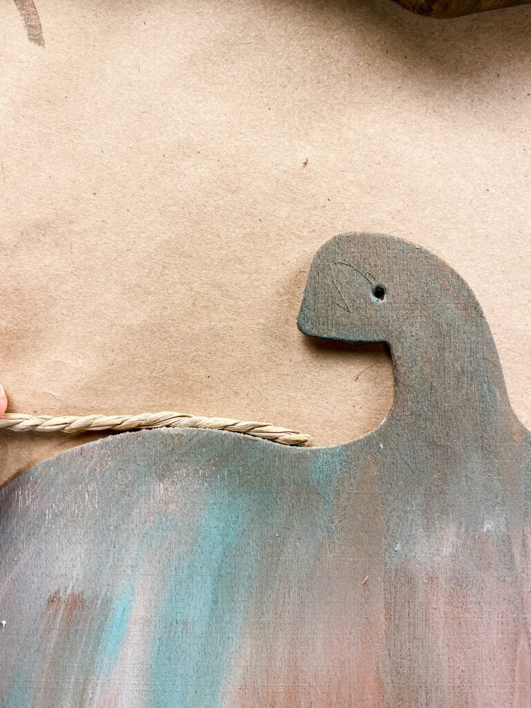 adding jute to the edge of a Fall sign