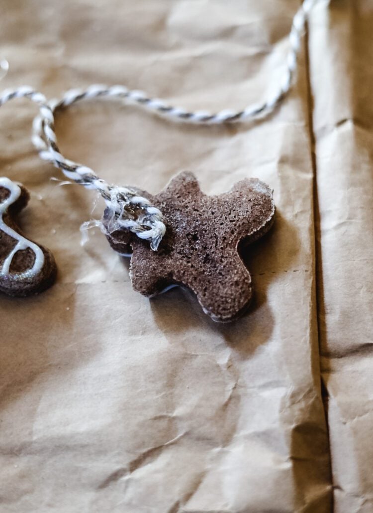 putting together a gingerbread man garland