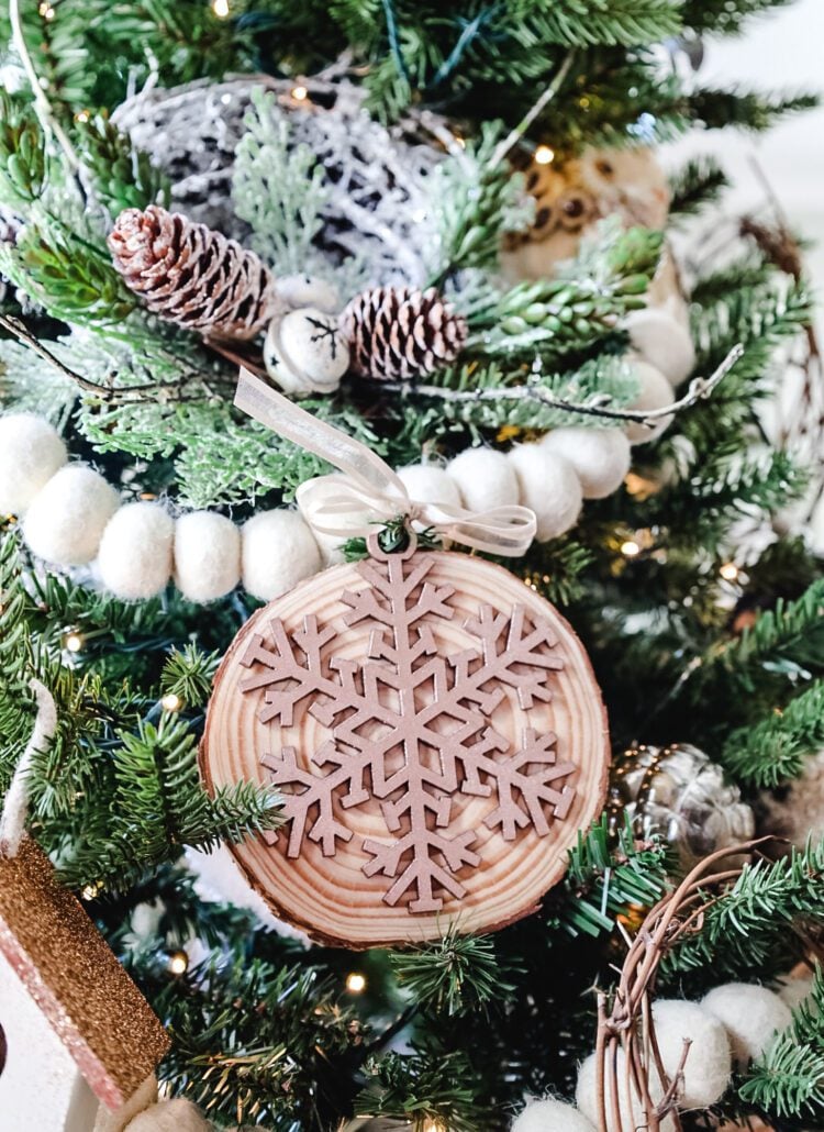 wood slice ornaments with snowflakes