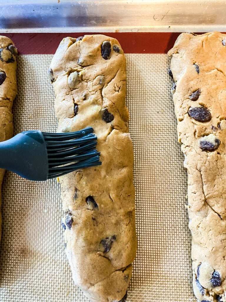 brushing hermit bars with beaten eggs