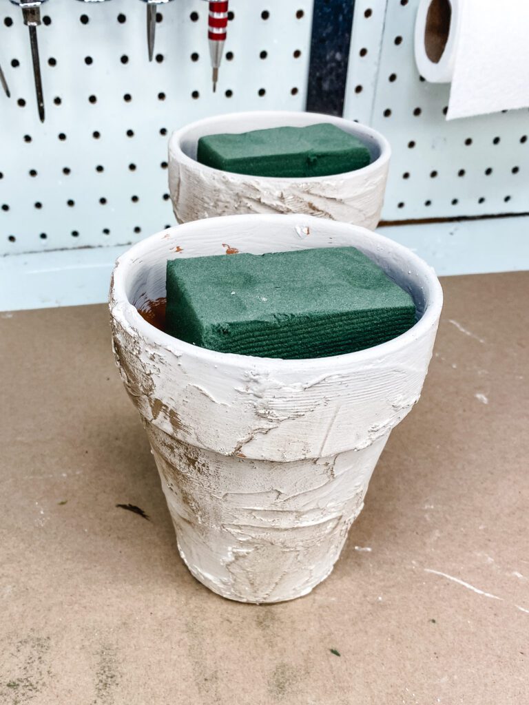 terra cotta pots with floral foam