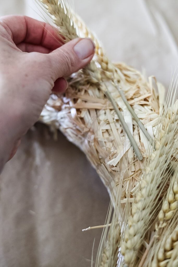 making a wreath with dried wheat