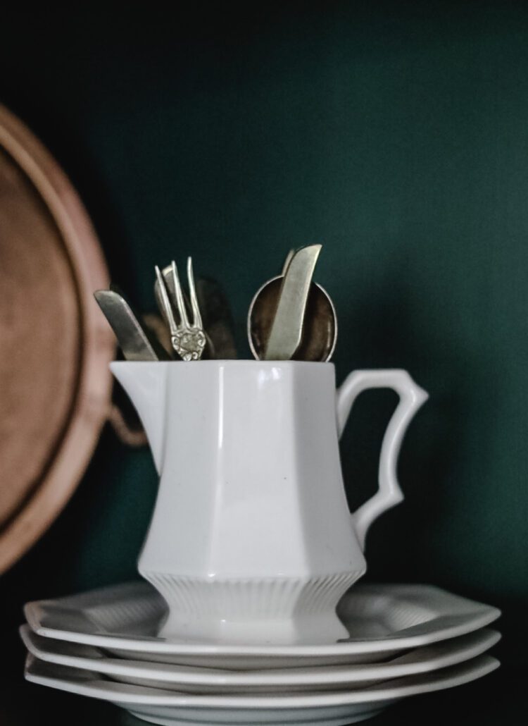 white ironstone creamer in china hutch