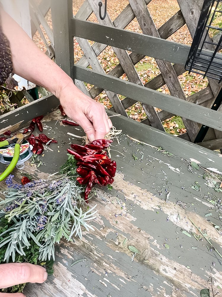 making a herb swag with chilis