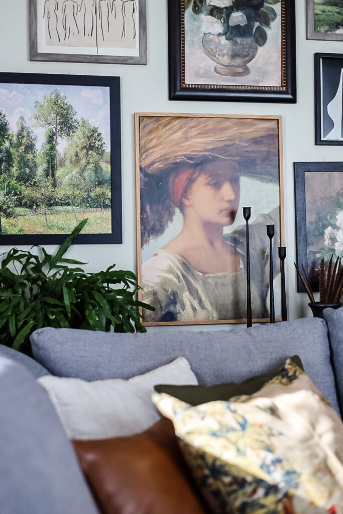 gallery wall picture of a woman with basket on her head