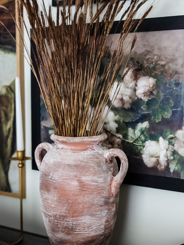 vase filled with dried grass