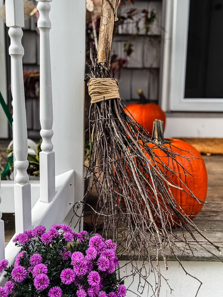 diy stick witch broom on porch