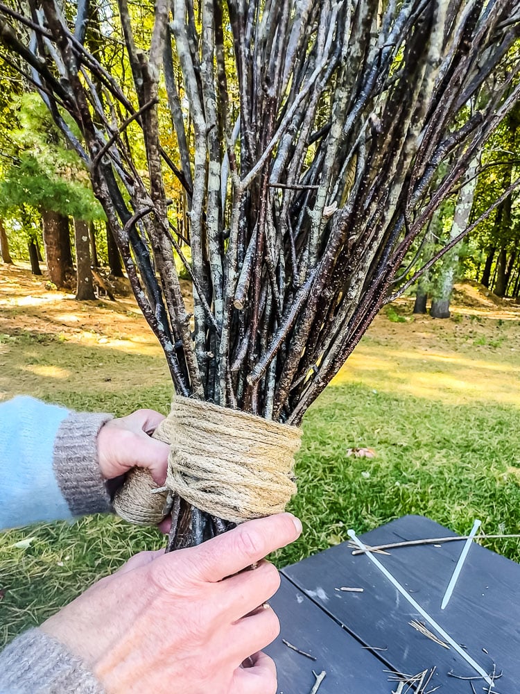 making a witch broom out of sticks