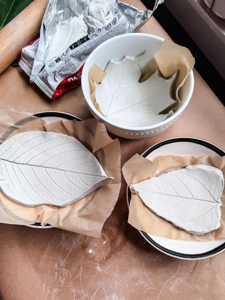 clay leaf shaped dishes being made