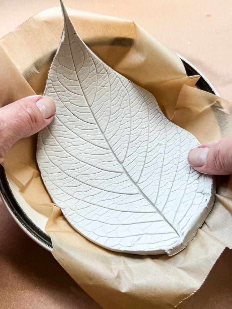 making a leaf shaped dish out of clay