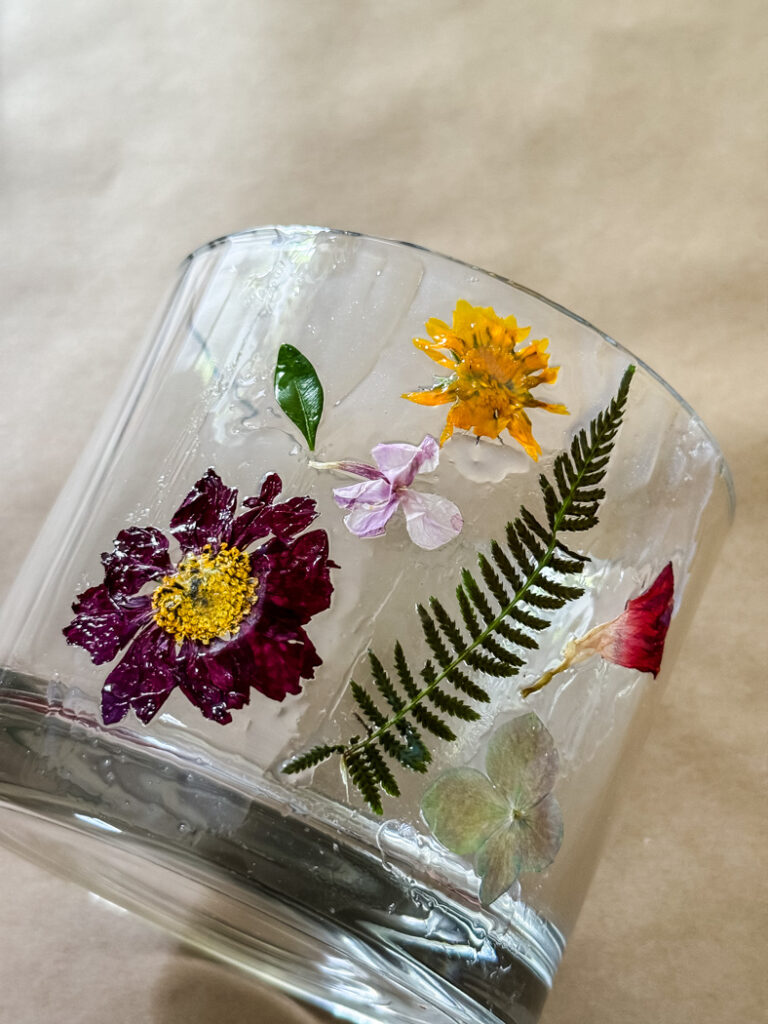 pressed flowers on a glass vase