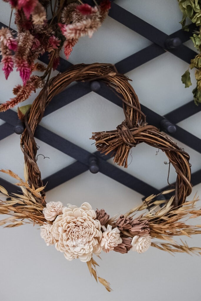 a heart wreath hanging on a hook