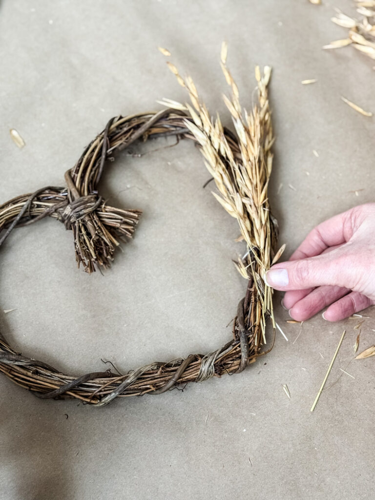 dried oat stems on a wreath