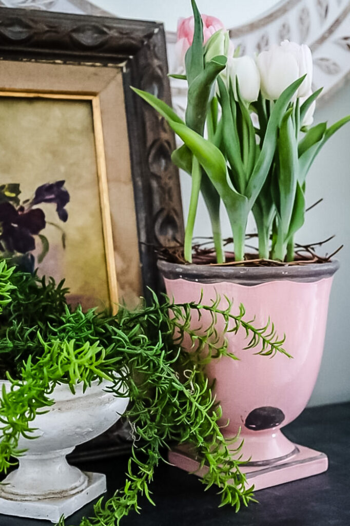 pink pastel vase with flowering tulips