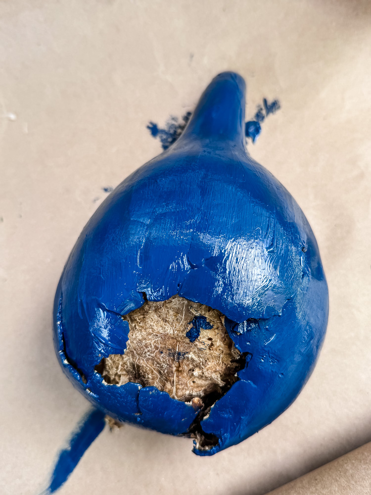 painting a gourd to be a fairy house