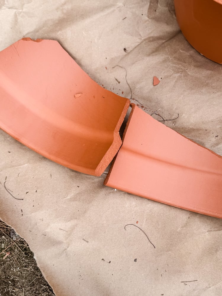 pieces of a broken terracotta pot