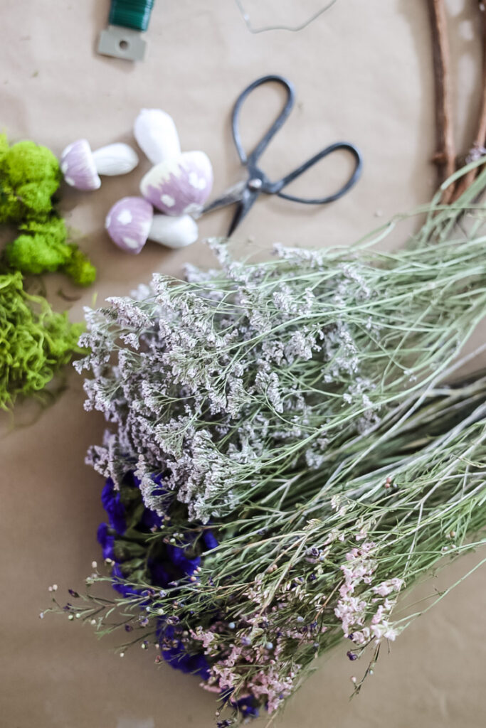 supplies to make a fairy wreath including dried flowers