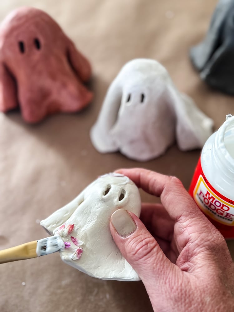decoupage flowers on a clay ghost form