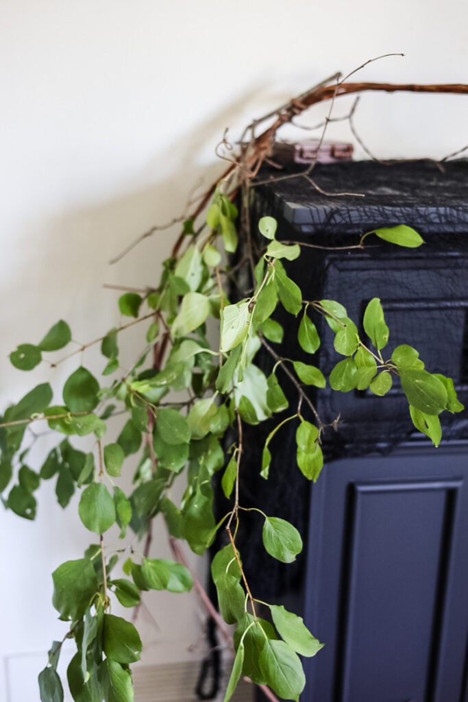 branches being used to create a fall garland