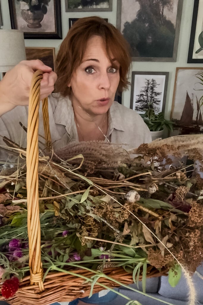 Jennifer Howard holding basket of flowers