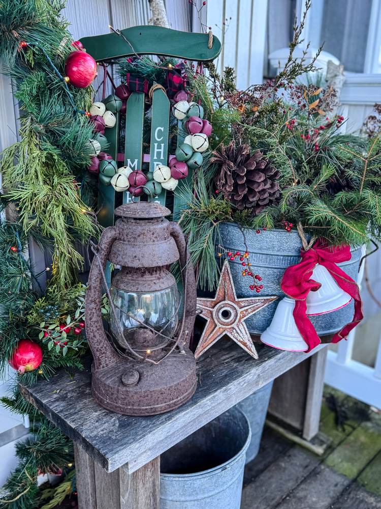 christmas porch bench with seasonal decorations