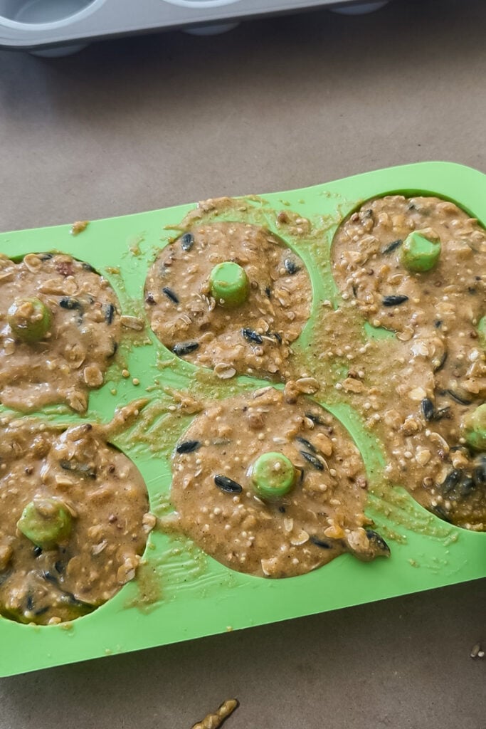 making homemade suet rings using a silicone donut pan