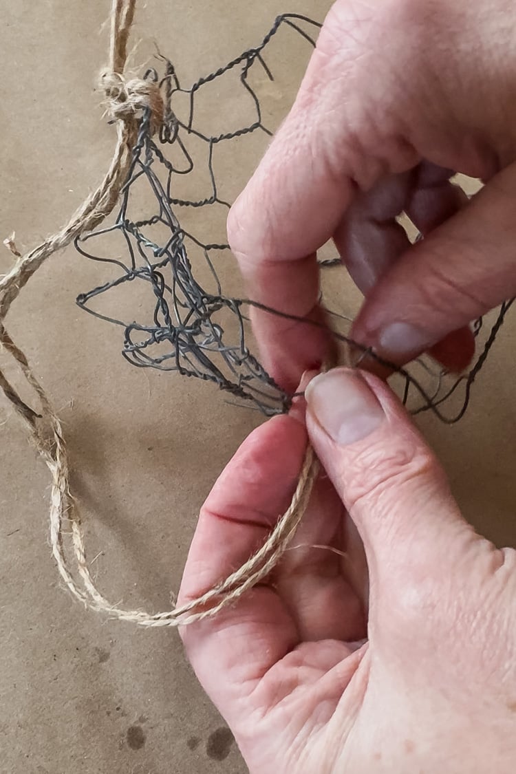 crafting a suet basket with chicken wire and jute