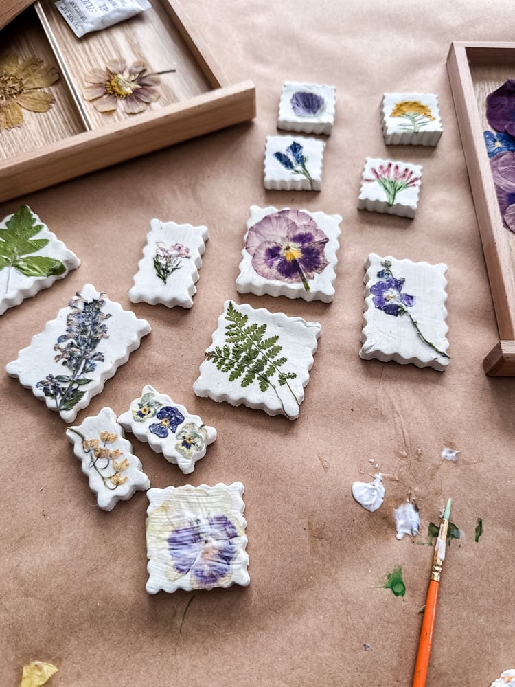 pressed flower air-dry clay magnets being made