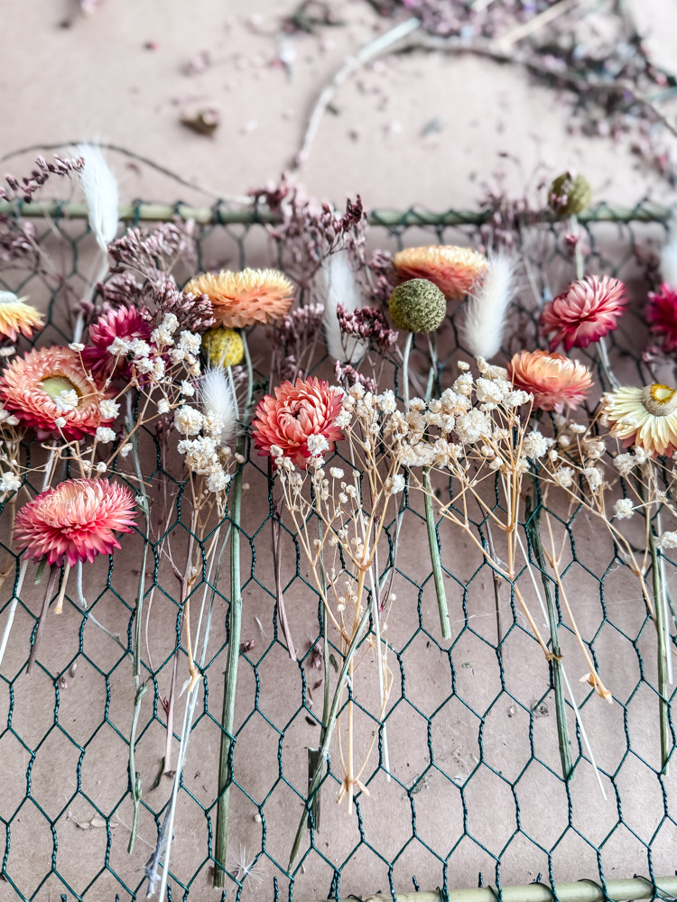dried flowers on a chicken wire frame