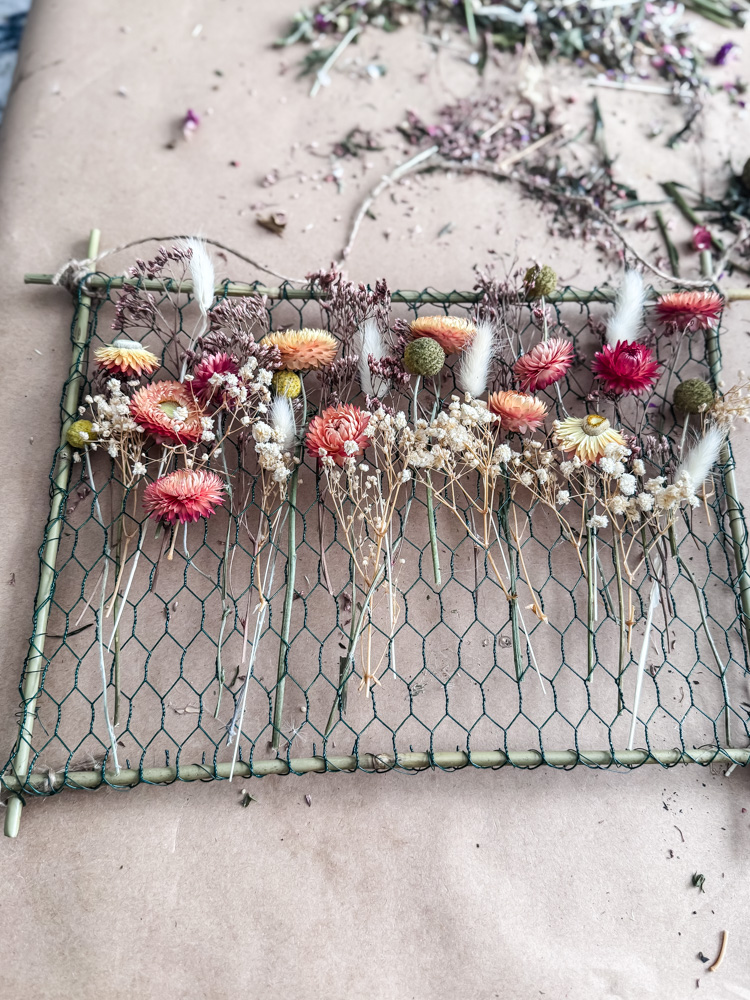 dried flowers on a chicken wire frame