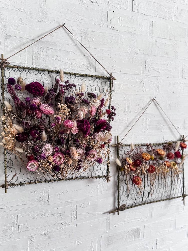 2 hanging frames with dried flowers