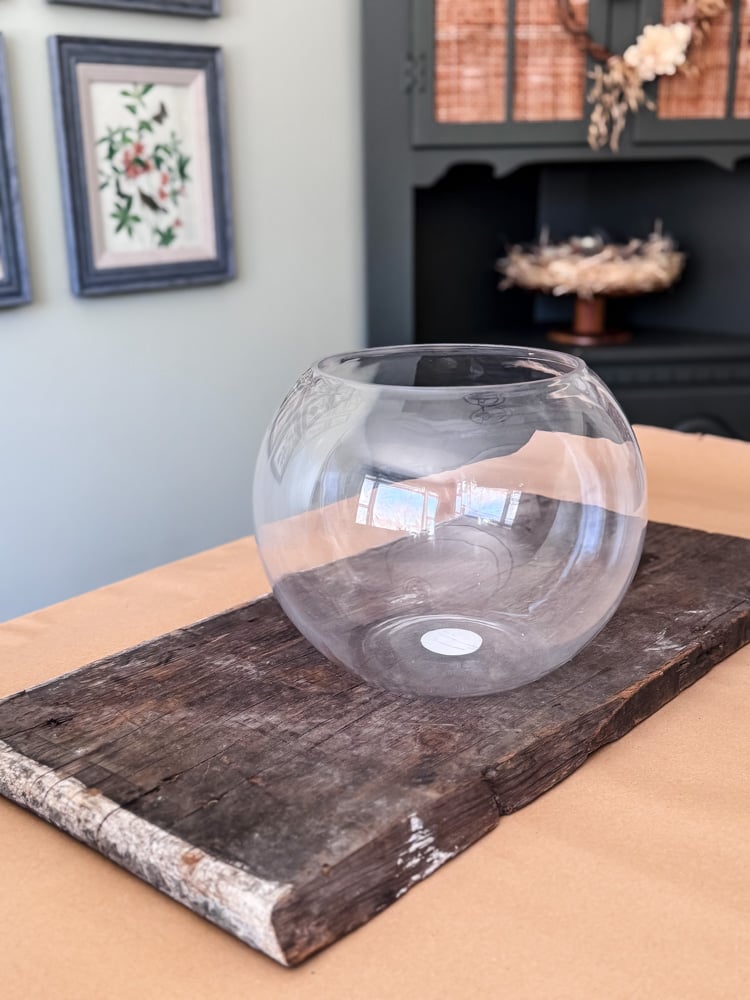 a large glass bubble bowl on table