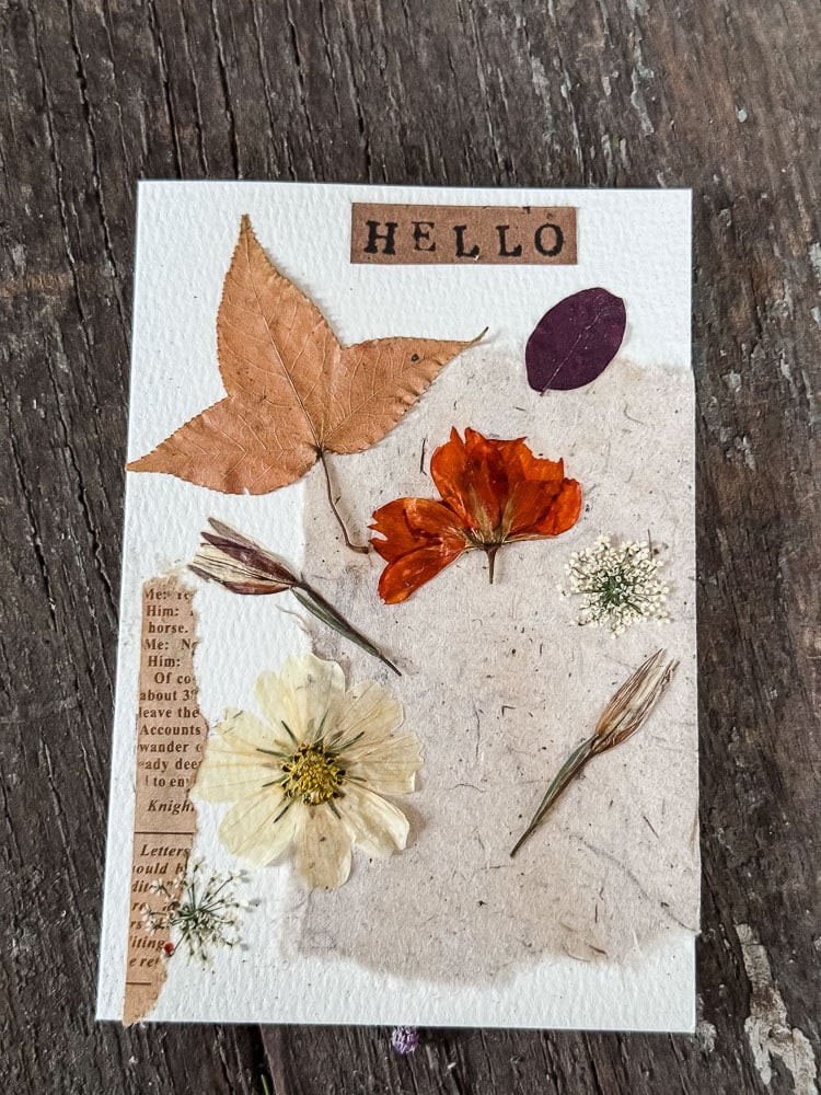 handmade notecard with a hello stamped on it.