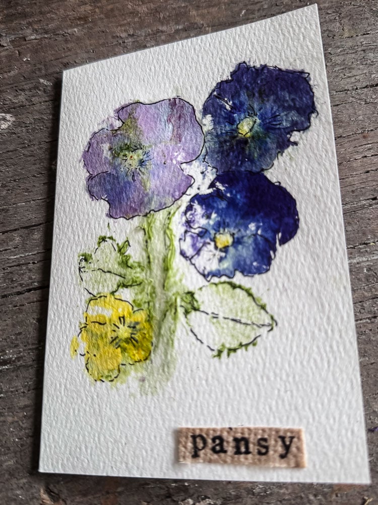 a handmade notecard with pansies