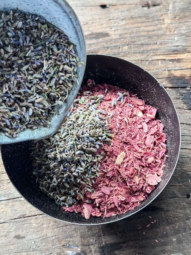 mxing cedar and lavender in a bowl