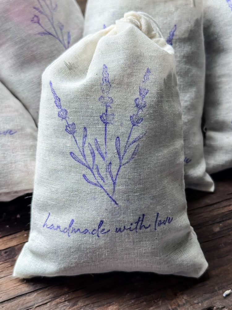 homemade lavender sachet in a stamped muslin bag