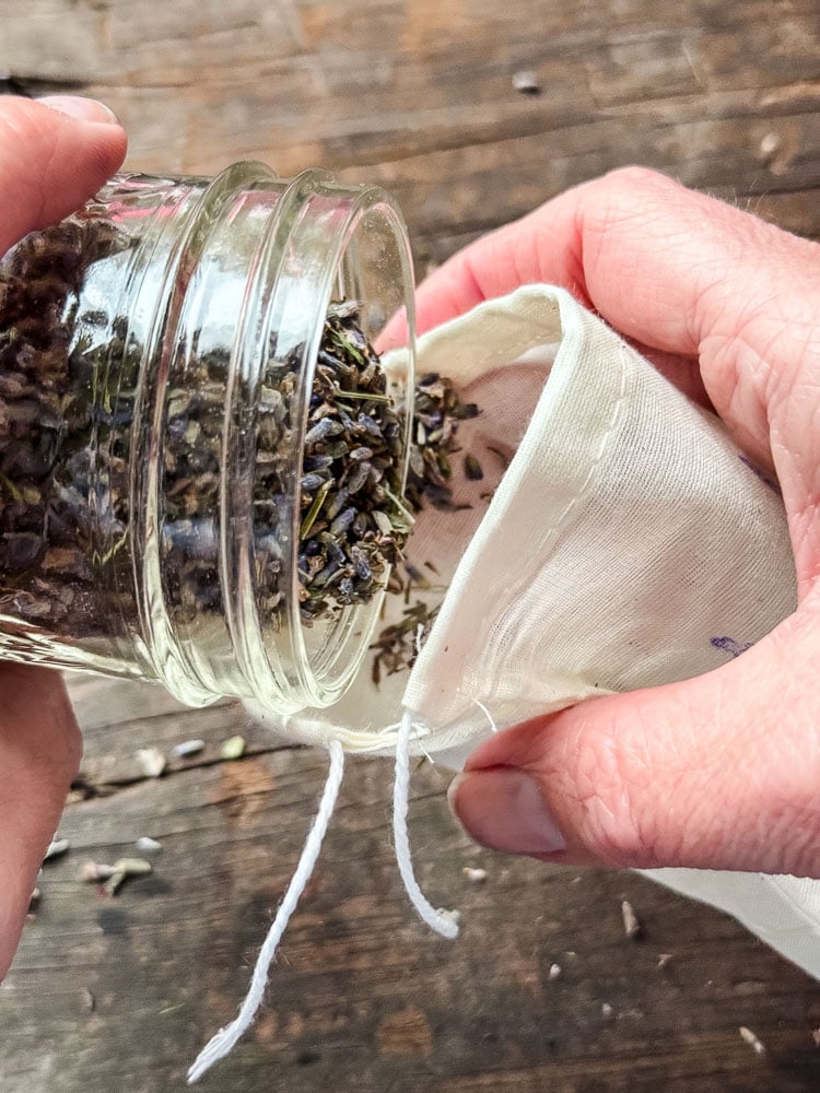 filling a sachet with lavender
