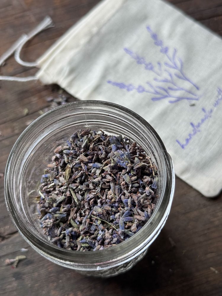 supplies to make lavender sachet, a jar of lavender and muslin bag