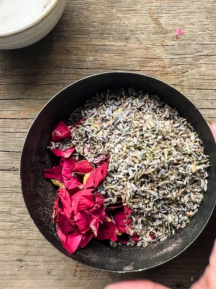 rose petals and lavender buds in a metal dish