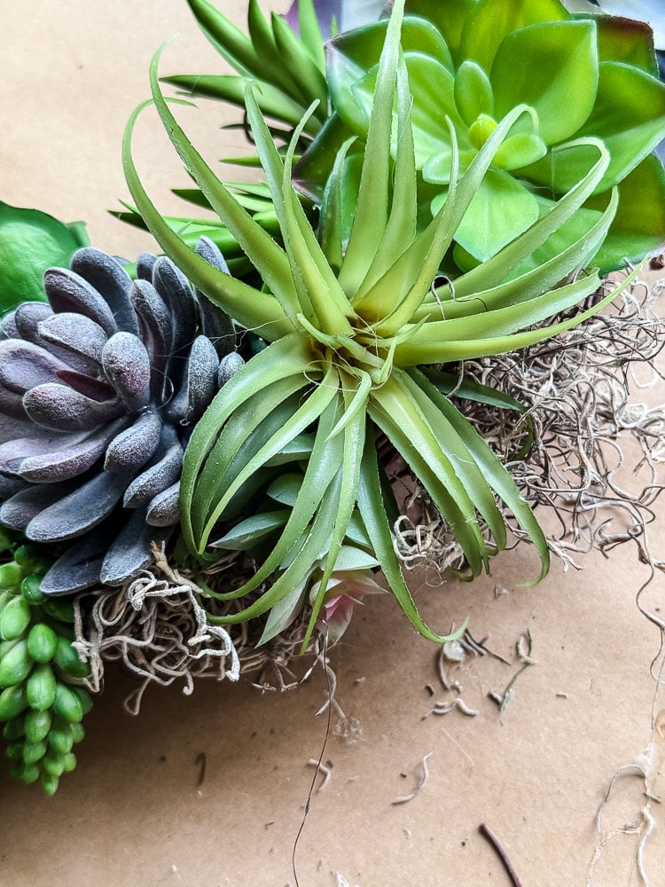 closeup of a faux succulent wreath