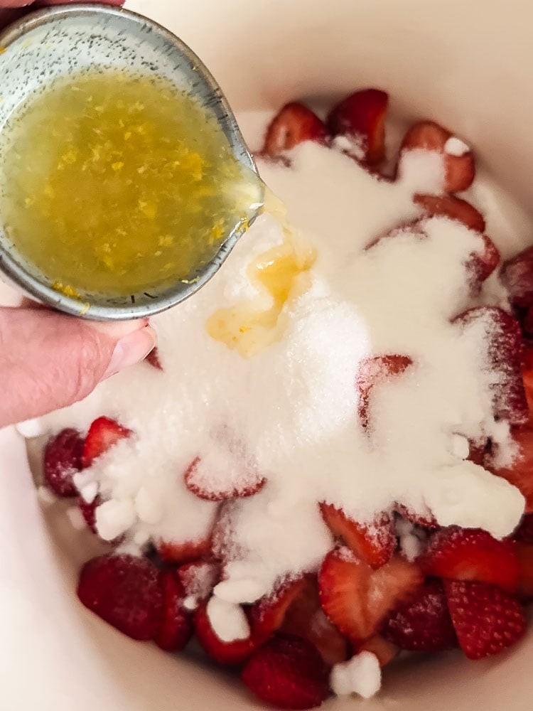 making strawberry jam: a pan with the ingredients