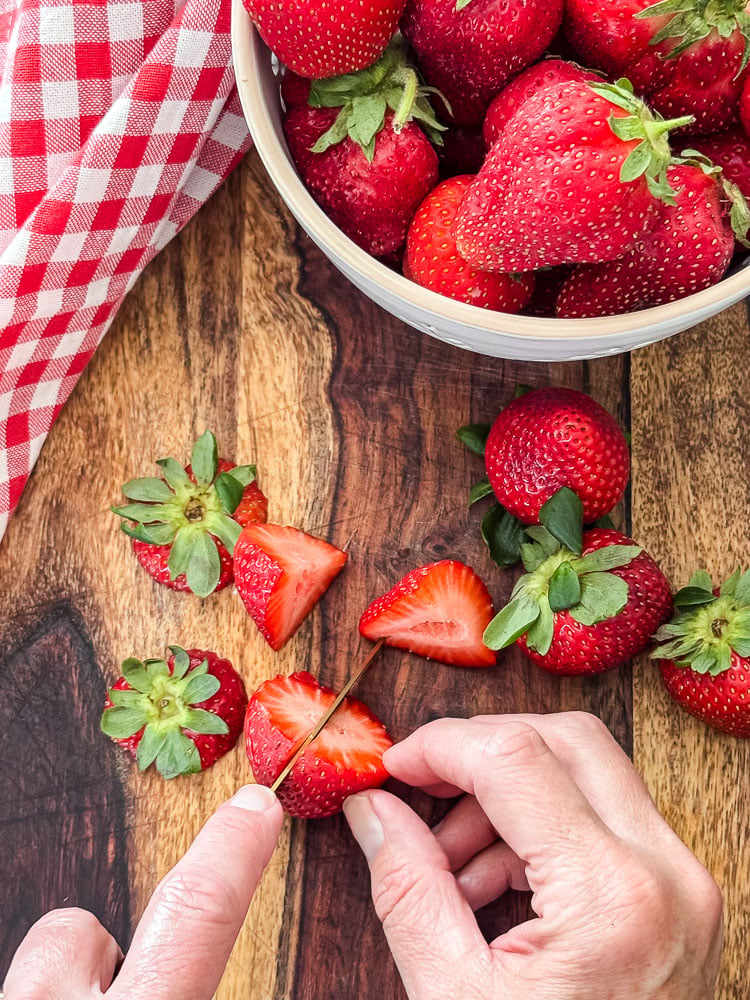 cutting strawberries