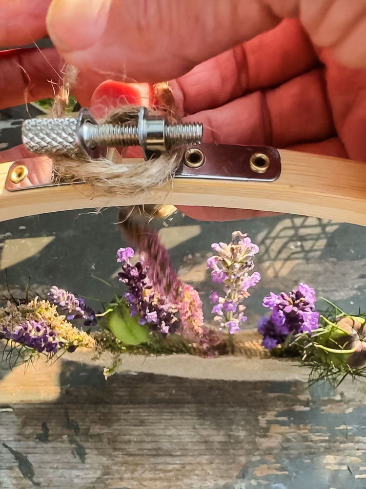 tying jute onto an embroidery hoop