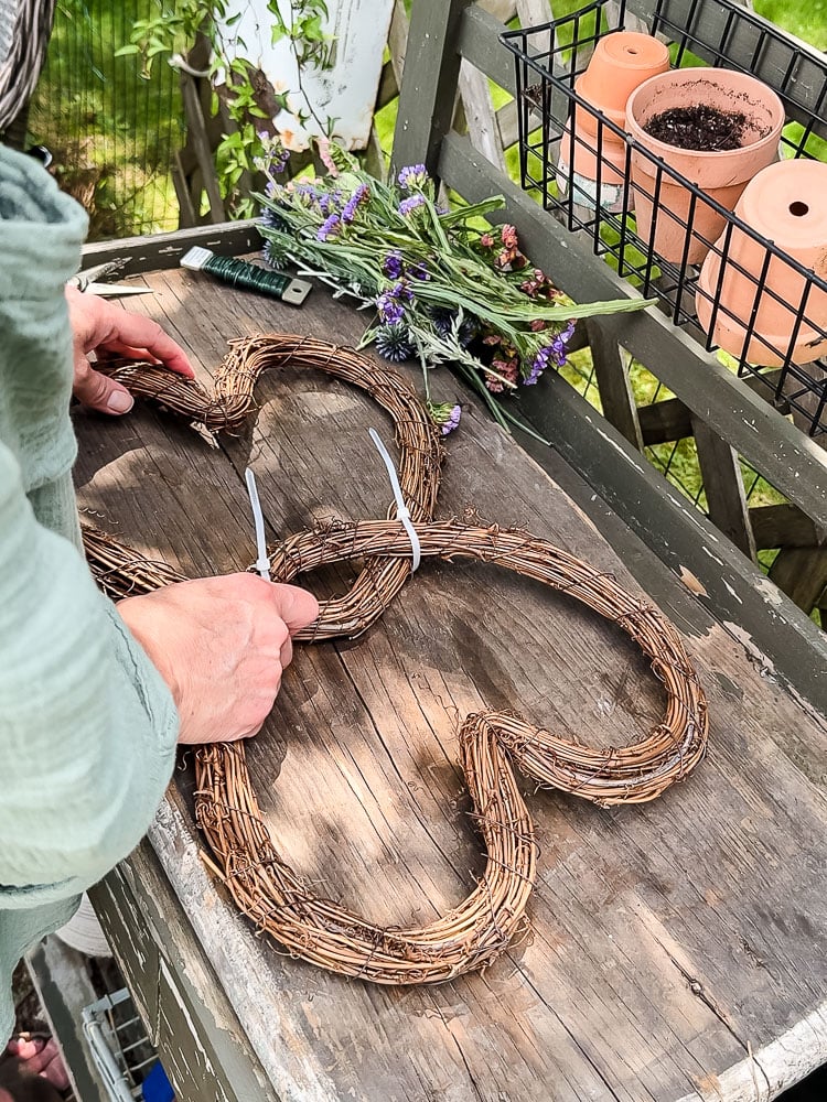attaching 2 heart shapeed wreaths in center to form a butterfly shape