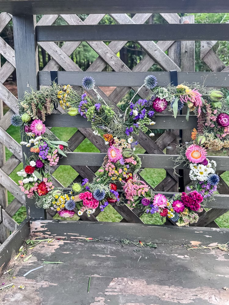 butterfly shaped wreath made with garden flowers